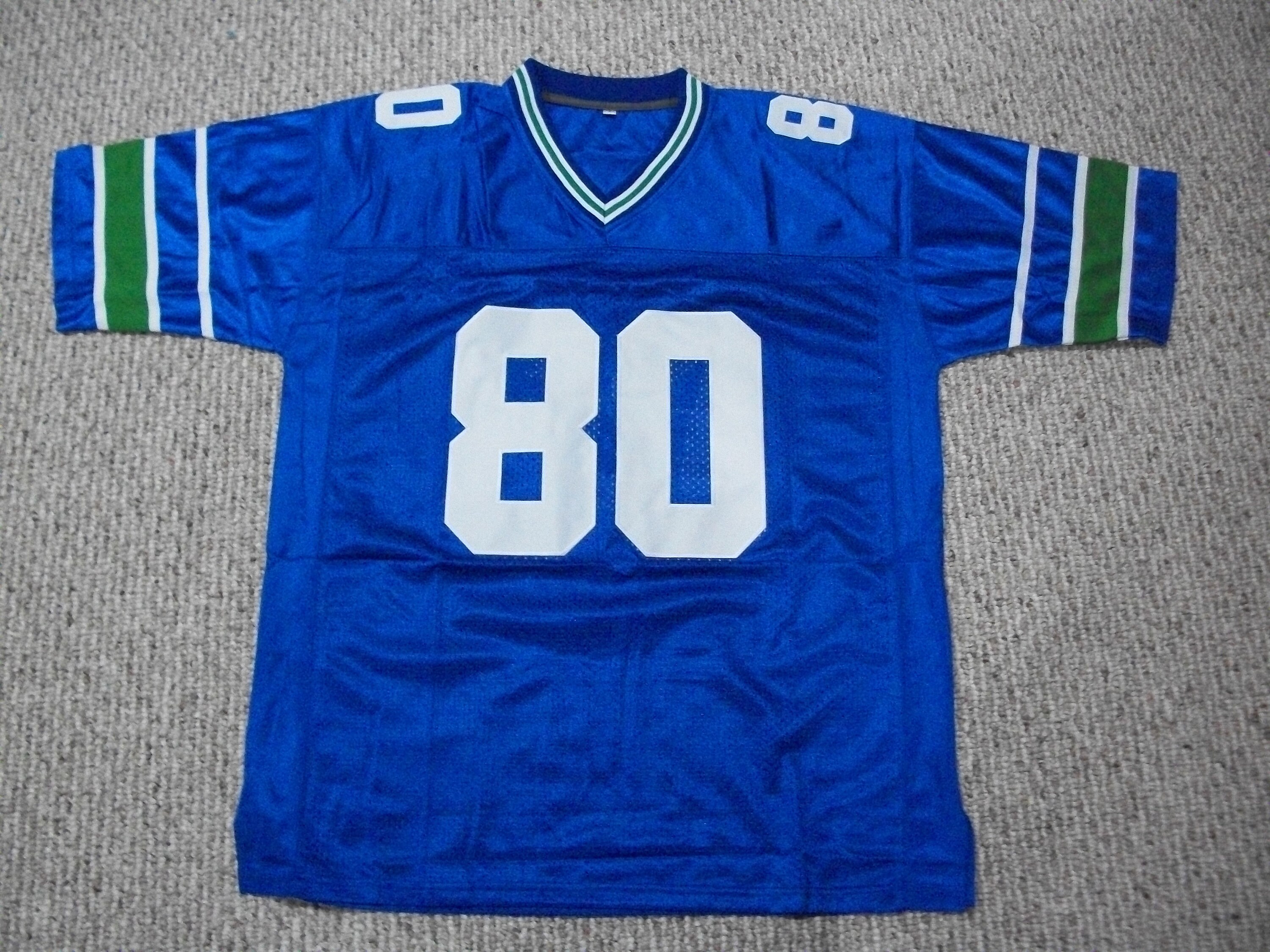 thumbnail interactive-video image 1 of Custom Steve Tasker Buffalo Bills Blue Football Jersey – Unsigned, Sewn Numbers (S-3XL) 1 of 3