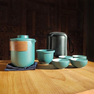 Black Pottery Reise-Teeset, chinesische Kungfu-Keramik-Teekanne mit Anti-Verbrühungsring, 1 Teekanne, 1 Teesieb, 4 Tassen in der Reisetasche, Geschenk für Teeliebhaber Bild 7