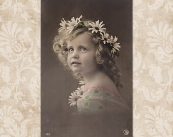 Adorable girl with flower wreath in her hair - Original vintage postcard from the early 1900's.