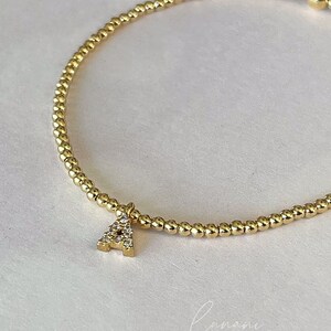 Pulsera 1 letra oro-zirconia