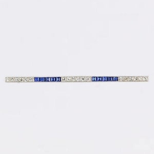 Platinum, sapphire and diamond barrette brooch