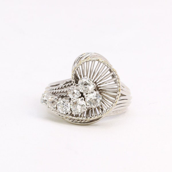 Bague tourbillon en or blanc et diamants 1 ct