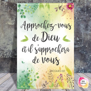 May include: A watercolor print with a floral border and a quote in French: "Approchez-vous de Dieu et il s'approchera de vous" (Draw near to God and He will draw near to you). The quote is attributed to Jacques 4:8.