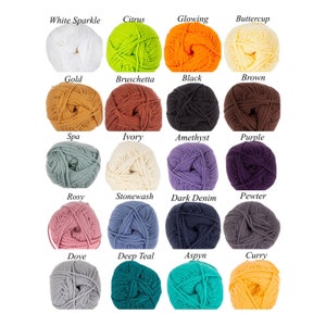 May include: A grid of twenty round yarn balls in various colours, each labelled with text including White Sparkle, Citrus, Glowing, Buttercup, Gold, Bruschetta, Black, Brown, Spa, Ivory, Amethyst, Purple, Rosy, Stonewash, Dark Denim, Pewter, Dove, Deep Teal, Aspyn, and Curry.
