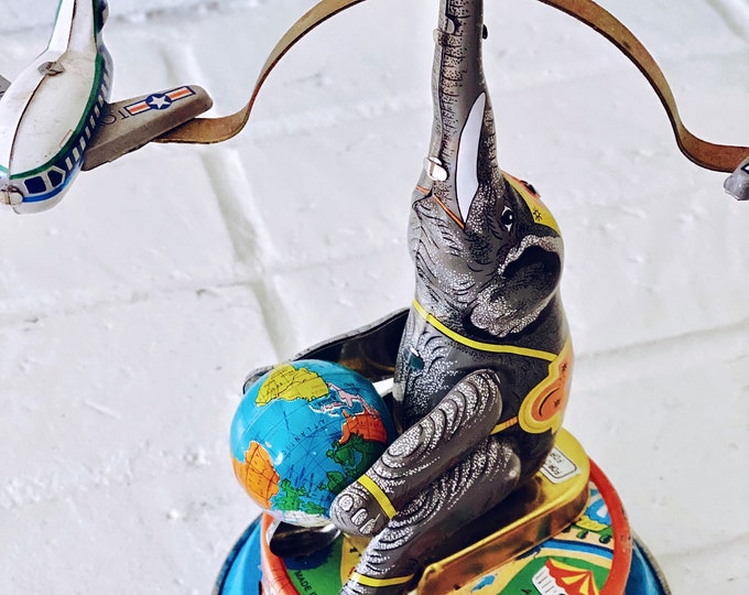 Windup Toy Elephant & Flying Airplanes Etsy