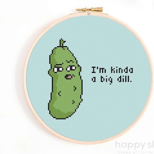 May include: A cross stitch pattern featuring a green pickle with a face and the text "I'm kinda a big dill."
