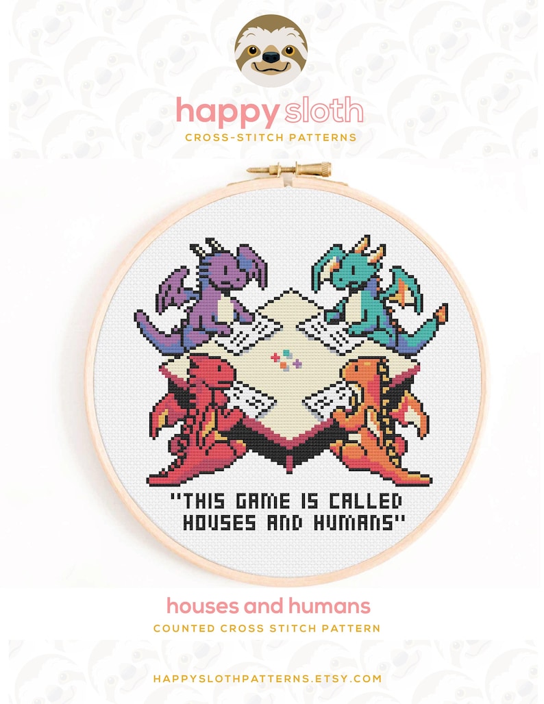 May include: A cross-stitch pattern in a wooden hoop shows four pixelated dragons playing a game. The dragons are purple, teal, red, and orange. The text "THIS GAME IS CALLED HOUSES AND HUMANS" is below the game scene. The pattern is titled "houses and humans".