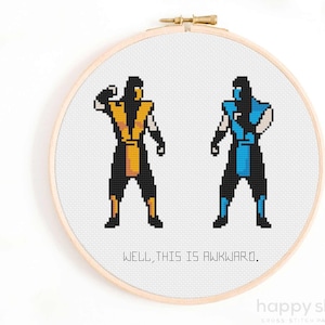 May include: Cross stitch pattern featuring the video game characters Scorpion and Sub-Zero from Mortal Kombat. The characters are facing each other with the text "Well, this is awkward." below them.