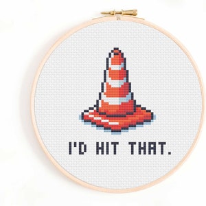 May include: Cross-stitch pattern featuring a red and white traffic cone with the text "I'd hit that."
