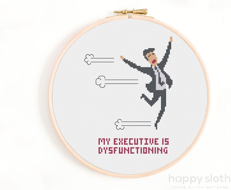a cross stitch picture of a man in a suit
