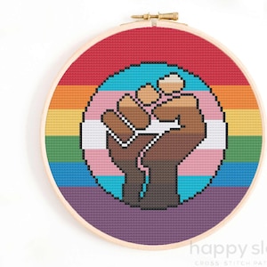 a cross stitch picture of a pride flag