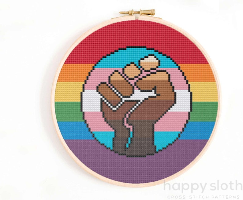 a cross stitch picture of a pride flag