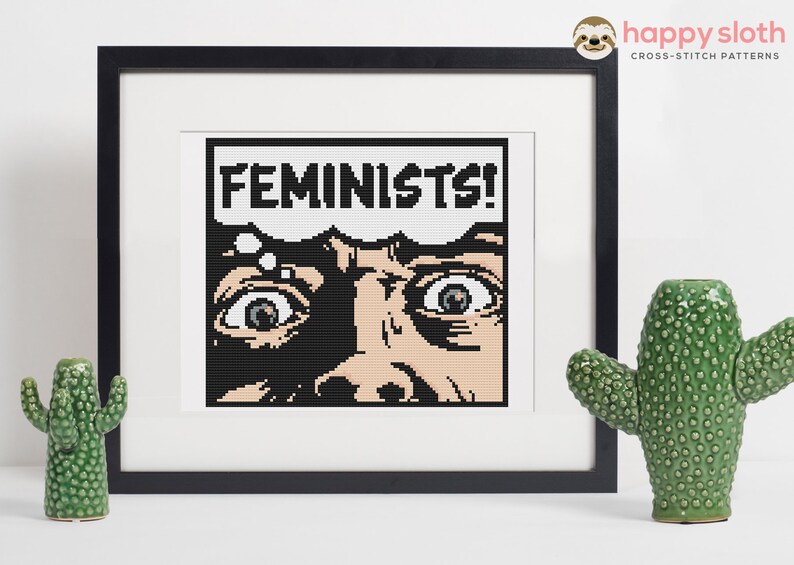 May include: Cross-stitch pattern of a person with wide eyes looking up with the word "FEMINISTS!" in a thought bubble above their head.