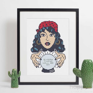 May include: Cross-stitch pattern featuring a woman with dark hair and a red bandana, holding a crystal ball with the text "Every Thing Will Be Ok".