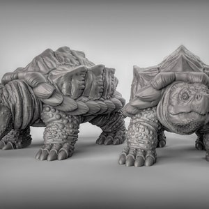 May include: Two gray, detailed, 3D printed models of snapping turtles with open mouths. The turtles are posed in a walking position.