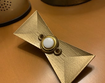 Modernist hour glass doorbell.