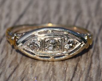 Antique East to West Navette Two Tone Diamond Ring