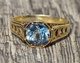 Anillo de compromiso antiguo con aguamarina y filigrana en oro amarillo