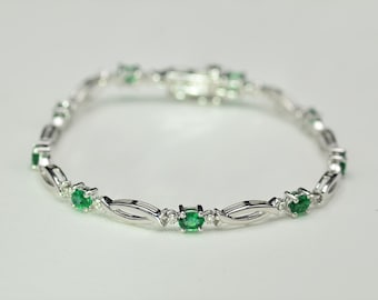 Ladies Contemporary Emerald and Diamond Bracelet in 14K Gold