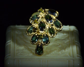 Anillo de turmalina y andalucita en oro amarillo