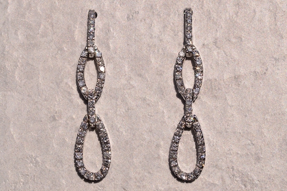 Diamond Dangler Earrings in White Gold - image 1