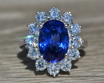 Ladies Signed 18K White Gold Ring set with 4.86 CT  Sapphire and Diamond Halo