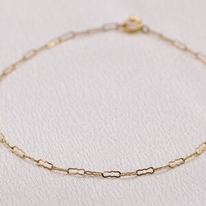 Pulseira antiga leve com elos abertos e preenchida com ouro