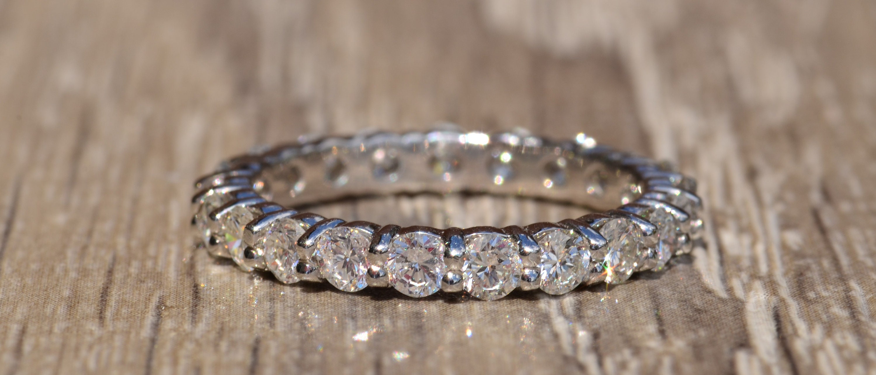 Custom 14 Karat White Gold Shared Prong Eternity Band Set With 2