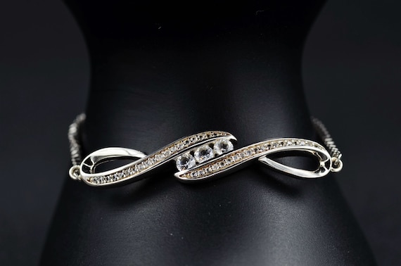 Ladies Adjustable Modified Infinity Bracelet in S… - image 1
