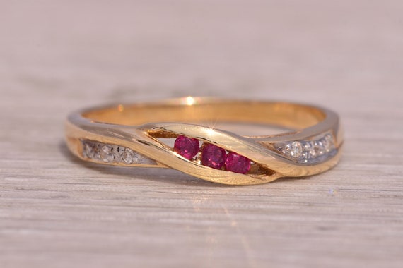 Ruby and Natural Diamond Ring in Yellow Gold - image 1