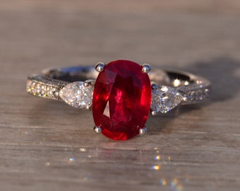 Oval Natural Ruby and Diamond Engagement Ring in White Gold