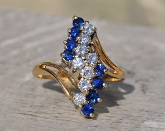 Vintage cocktailring met saffier en diamant