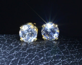 14 Karat Yellow Gold Studs set with 1.50 total weight in Cubic Zirconia