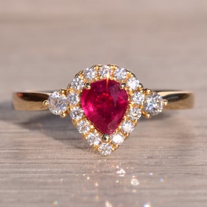 Vivid Pear Shaped Natural Ruby and Natural Diamond Ring