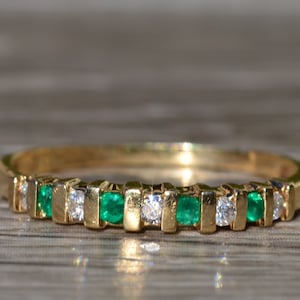 Ladies 14K Yellow Gold Emerald and Diamond Band