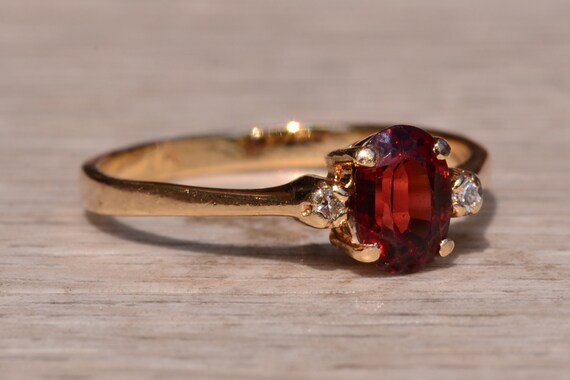 Garnet and Diamond Three Stone Ring In Yellow Gold - image 5