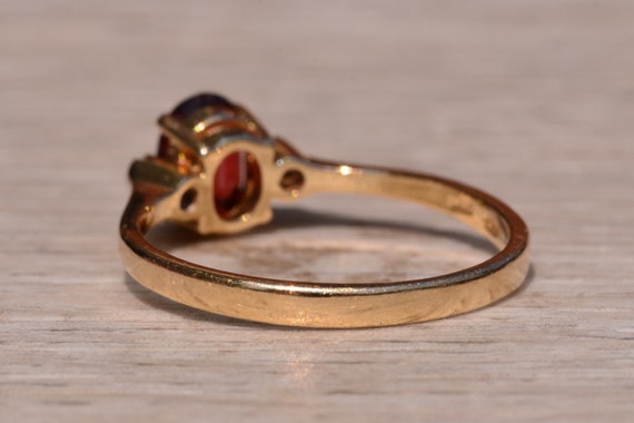 Garnet and Diamond Three Stone Ring In Yellow Gold - image 3