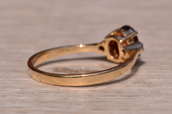 Garnet and Diamond Three Stone Ring In Yellow Gold - image 4
