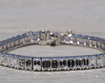 Vintage Platinum Tennis Bracelet with Emerald Cut Diamonds