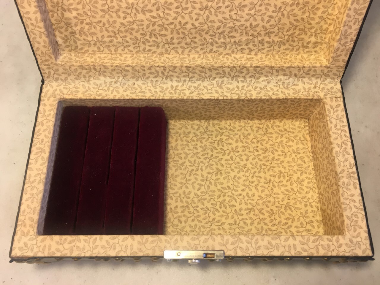 Black Leather Covered Jewelry Case with Traditional nailing pattern