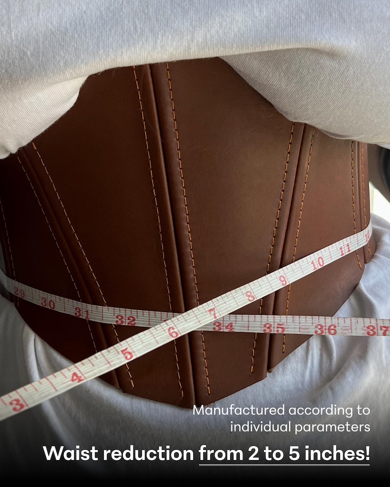 May include: A brown corset with vertical stitching and a measuring tape wrapped around it. The tape shows measurements from 29 to 37 inches. Text at the bottom reads "Waist reduction from 2 to 5 inches!"