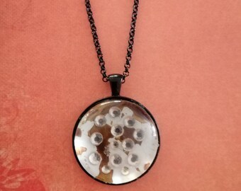 Pendant black circle diamontes on alcahol ink background