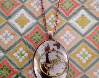 Love pendant on Alcahol ink background