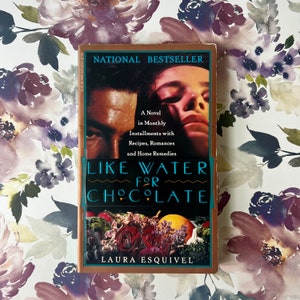 Like Water for Chocolate by Laura Esquivel, 1994, Anchor Books, Great condition. Classic read! Traditional recipes inside!