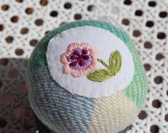 Little Pink flower embroidered upcycled blanket pin holder. Pincushion on black reused tin.