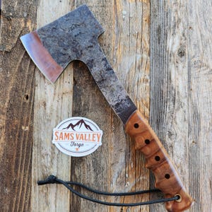 Hatchet with curly maple handle.
