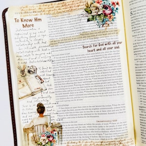 May include: A close-up of a page from a Bible with handwritten notes and colorful illustrations. The text on the page includes the words "To Know Him More" and "Search for God with all your heart and all your soul."