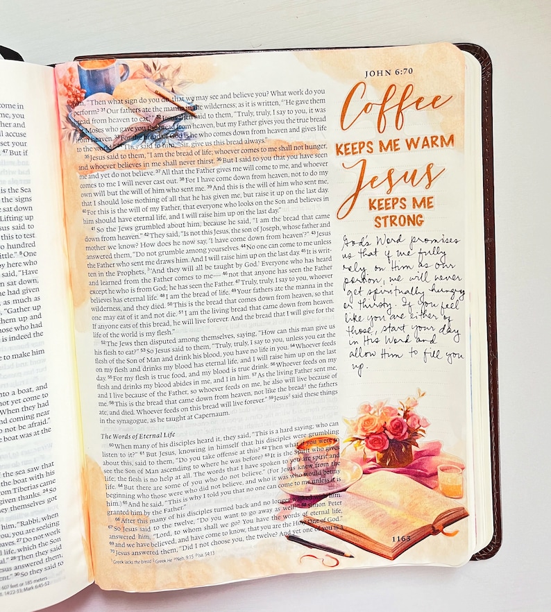 May include: A Bible page with handwritten notes and a watercolor illustration of a coffee cup, a vase of flowers, and a book. The text on the page reads "Coffee keeps me warm, Jesus keeps me strong." The handwritten notes say "God's Word promises that if we fully rely on Him as our portion, we will never get spiritually hungry or thirsty. If you feel like you are either of those, start your day in His Word and allow Him to fill you up."