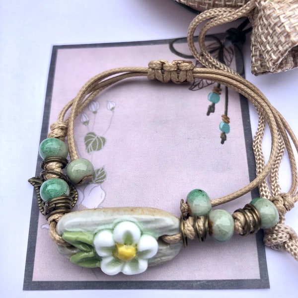 Beautiful Glazed Ceramic Bracelet hand painted detail beads leaf charm adjustable cord