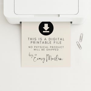 May include: A white printer printing a beige paper with black text and a black download icon. The text reads "THIS IS A DIGITAL PRINTABLE FILE" and "by Every Muslim". Two silver paper clips are visible.